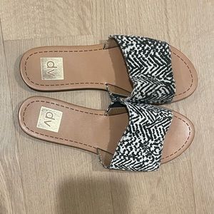 Size 7 Dolce Vita Sandals. Great condition. real leather. Tan bottom black/white